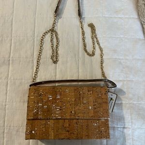 Cute boxy cork purse. Great look for Spring and Summer. New with tags